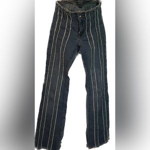 Jeans with frayed stripes